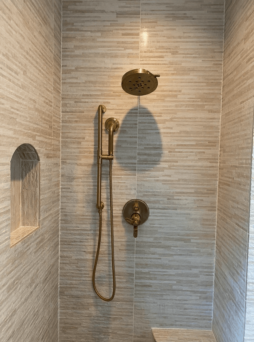 Brushed-brass walk-in shower in Manhattan Beach