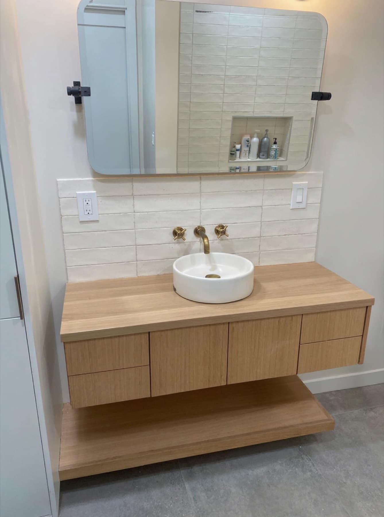 Oak floating vanity bathroom remodel in Santa Monica